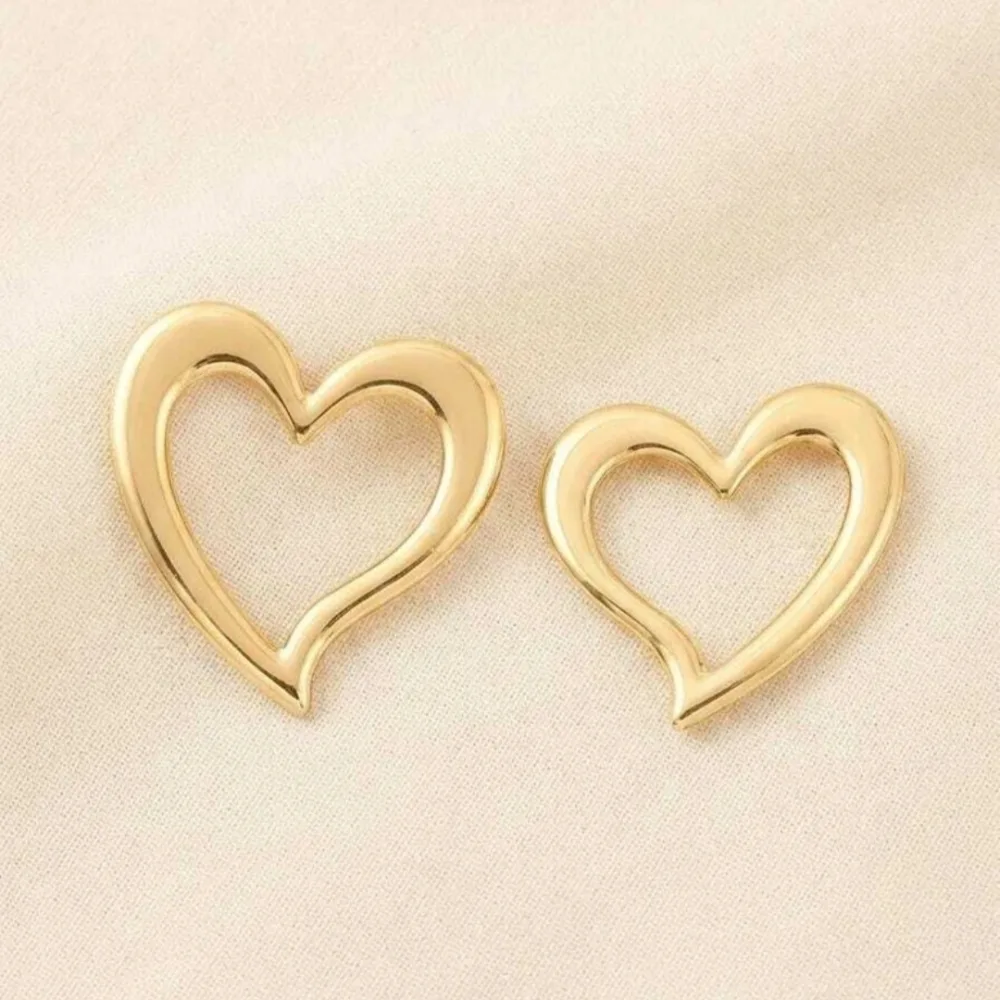 Hollow Asymmetric Heart Gold Plated Stud Earrings Alloy Stud Earring on Flipkart photo 2
